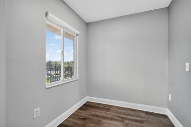 Beautifully renovated and spacious 2-bedroom, 2-bath condo with on Flamingo Lakes Country Club in Florida - for sale on GolfHomes.com, golf home, golf lot