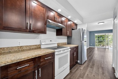 Beautifully renovated and spacious 2-bedroom, 2-bath condo with on Flamingo Lakes Country Club in Florida - for sale on GolfHomes.com, golf home, golf lot
