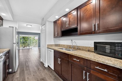 Beautifully renovated and spacious 2-bedroom, 2-bath condo with on Flamingo Lakes Country Club in Florida - for sale on GolfHomes.com, golf home, golf lot