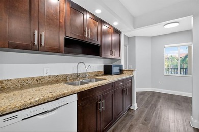 Beautifully renovated and spacious 2-bedroom, 2-bath condo with on Flamingo Lakes Country Club in Florida - for sale on GolfHomes.com, golf home, golf lot