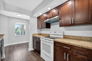 Beautifully renovated and spacious 2-bedroom, 2-bath condo with on Flamingo Lakes Country Club in Florida - for sale on GolfHomes.com, golf home, golf lot