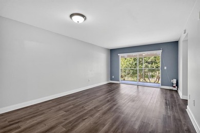 Beautifully renovated and spacious 2-bedroom, 2-bath condo with on Flamingo Lakes Country Club in Florida - for sale on GolfHomes.com, golf home, golf lot