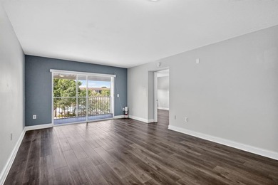 Beautifully renovated and spacious 2-bedroom, 2-bath condo with on Flamingo Lakes Country Club in Florida - for sale on GolfHomes.com, golf home, golf lot