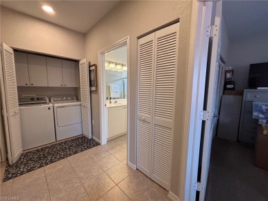 Priced below market value. Lovely unfurnished second-floor unit on Lely Resort Golf and Country Club in Florida - for sale on GolfHomes.com, golf home, golf lot