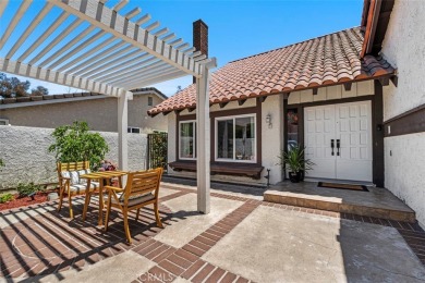 Welcome to this CHARMING two-story residence nestled in one of on Mission Viejo Country Club in California - for sale on GolfHomes.com, golf home, golf lot