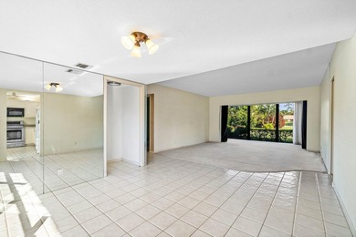 Spacious 2-bedroom, 2-bath first-floor condo overlooking the on Quail Ridge Golf Course and Country Club in Florida - for sale on GolfHomes.com, golf home, golf lot