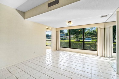 Spacious 2-bedroom, 2-bath first-floor condo overlooking the on Quail Ridge Golf Course and Country Club in Florida - for sale on GolfHomes.com, golf home, golf lot