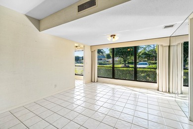Spacious 2-bedroom, 2-bath first-floor condo overlooking the on Quail Ridge Golf Course and Country Club in Florida - for sale on GolfHomes.com, golf home, golf lot