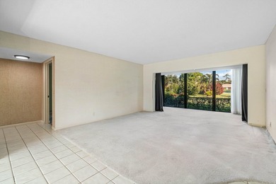 Spacious 2-bedroom, 2-bath first-floor condo overlooking the on Quail Ridge Golf Course and Country Club in Florida - for sale on GolfHomes.com, golf home, golf lot