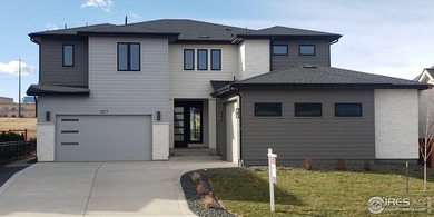 Entertainer's delight perched on a premier .25-acre lot in the on Coal Creek Golf Course in Colorado - for sale on GolfHomes.com, golf home, golf lot