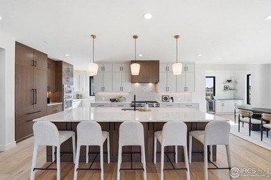 Entertainer's delight perched on a premier .25-acre lot in the on Coal Creek Golf Course in Colorado - for sale on GolfHomes.com, golf home, golf lot