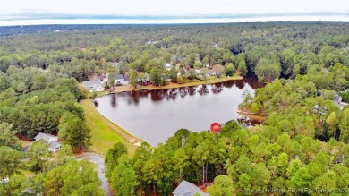 Beautiful wooded 0.34-acre lot located in the desirable Carolina on Carolina Lakes Country Club in North Carolina - for sale on GolfHomes.com, golf home, golf lot