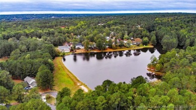 Beautiful wooded 0.34-acre lot located in the desirable Carolina on Carolina Lakes Country Club in North Carolina - for sale on GolfHomes.com, golf home, golf lot