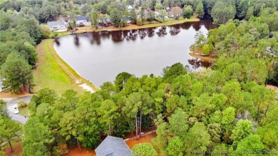 Beautiful wooded 0.34-acre lot located in the desirable Carolina on Carolina Lakes Country Club in North Carolina - for sale on GolfHomes.com, golf home, golf lot