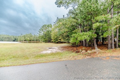 Beautiful wooded 0.34-acre lot located in the desirable Carolina on Carolina Lakes Country Club in North Carolina - for sale on GolfHomes.com, golf home, golf lot