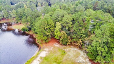 Beautiful wooded 0.34-acre lot located in the desirable Carolina on Carolina Lakes Country Club in North Carolina - for sale on GolfHomes.com, golf home, golf lot