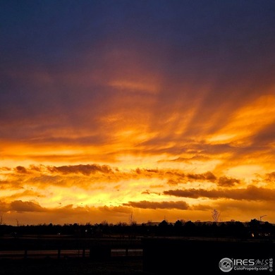 Fabulous ranch-style home with incredible mountain views backing on Raindance National Golf Course in Colorado - for sale on GolfHomes.com, golf home, golf lot