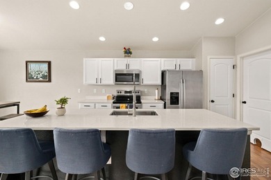 Fabulous ranch-style home with incredible mountain views backing on Raindance National Golf Course in Colorado - for sale on GolfHomes.com, golf home, golf lot