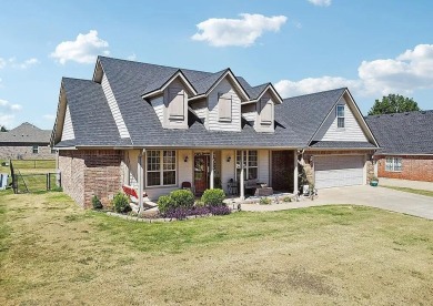 This charming 4-bedroom, 2-bath home in Patricia Island Country on Patricia Island Golf Club in Oklahoma - for sale on GolfHomes.com, golf home, golf lot