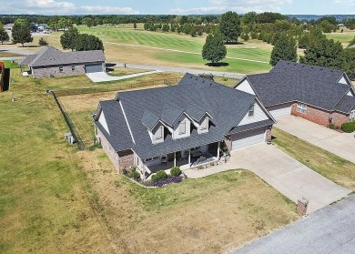 This charming 4-bedroom, 2-bath home in Patricia Island Country on Patricia Island Golf Club in Oklahoma - for sale on GolfHomes.com, golf home, golf lot