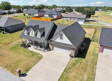 This charming 4-bedroom, 2-bath home in Patricia Island Country on Patricia Island Golf Club in Oklahoma - for sale on GolfHomes.com, golf home, golf lot