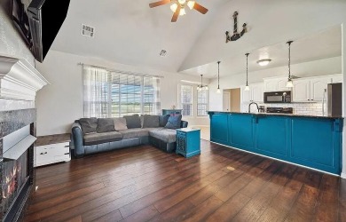 This charming 4-bedroom, 2-bath home in Patricia Island Country on Patricia Island Golf Club in Oklahoma - for sale on GolfHomes.com, golf home, golf lot