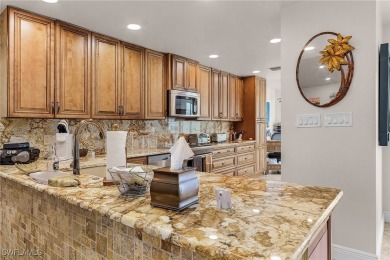 Discover luxury living in this stunning, fully updated on Fiddlesticks Country Club in Florida - for sale on GolfHomes.com, golf home, golf lot