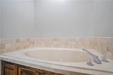 Nestled in the Staley Farms community, this 1.5 story townhome on Staley Farms Golf Club in Missouri - for sale on GolfHomes.com, golf home, golf lot