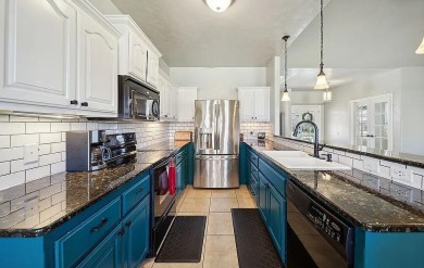 This charming 4-bedroom, 2-bath home in Patricia Island Country on Patricia Island Golf Club in Oklahoma - for sale on GolfHomes.com, golf home, golf lot