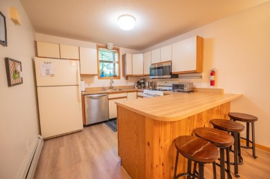 Lovely 2 bedroom condo as close as you can get to the 1st tee at on Hermitage Club Golf Course in Vermont - for sale on GolfHomes.com, golf home, golf lot