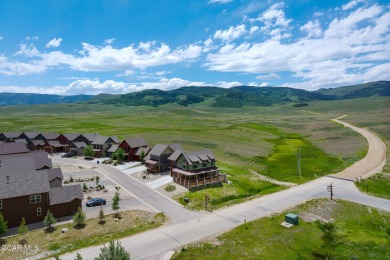 This stunning home, completed in 2022, has outstanding views on Grand Elk Ranch and Club in Colorado - for sale on GolfHomes.com, golf home, golf lot