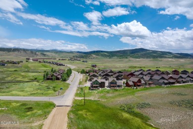 This stunning home, completed in 2022, has outstanding views on Grand Elk Ranch and Club in Colorado - for sale on GolfHomes.com, golf home, golf lot