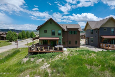 This stunning home, completed in 2022, has outstanding views on Grand Elk Ranch and Club in Colorado - for sale on GolfHomes.com, golf home, golf lot