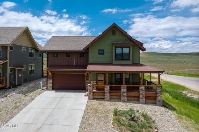This stunning home, completed in 2022, has outstanding views on Grand Elk Ranch and Club in Colorado - for sale on GolfHomes.com, golf home, golf lot