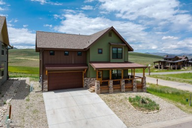This stunning home, completed in 2022, has outstanding views on Grand Elk Ranch and Club in Colorado - for sale on GolfHomes.com, golf home, golf lot