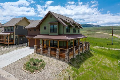 This stunning home, completed in 2022, has outstanding views on Grand Elk Ranch and Club in Colorado - for sale on GolfHomes.com, golf home, golf lot