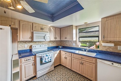 Welcome to the perfect blend of beauty and convenience in this on Falcon Watch Golf Club in Florida - for sale on GolfHomes.com, golf home, golf lot