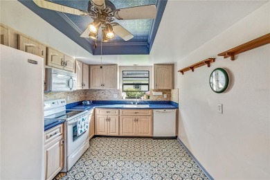 Welcome to the perfect blend of beauty and convenience in this on Falcon Watch Golf Club in Florida - for sale on GolfHomes.com, golf home, golf lot