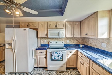 Welcome to the perfect blend of beauty and convenience in this on Falcon Watch Golf Club in Florida - for sale on GolfHomes.com, golf home, golf lot