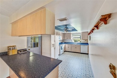 Welcome to the perfect blend of beauty and convenience in this on Falcon Watch Golf Club in Florida - for sale on GolfHomes.com, golf home, golf lot