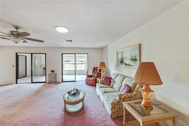 Welcome to the perfect blend of beauty and convenience in this on Falcon Watch Golf Club in Florida - for sale on GolfHomes.com, golf home, golf lot