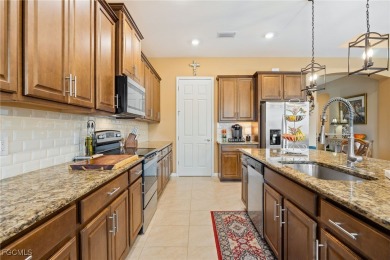 A must see beautiful home in the gated community of Entrada in on Sabal Springs Golf and Racquet Club in Florida - for sale on GolfHomes.com, golf home, golf lot