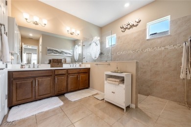 A must see beautiful home in the gated community of Entrada in on Sabal Springs Golf and Racquet Club in Florida - for sale on GolfHomes.com, golf home, golf lot