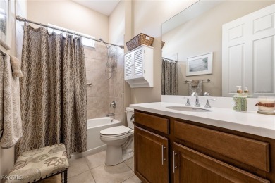 A must see beautiful home in the gated community of Entrada in on Sabal Springs Golf and Racquet Club in Florida - for sale on GolfHomes.com, golf home, golf lot