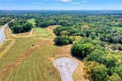 THIS LOT IS LOCATED IN THE EXCLUSIVE DOUBLE DIAMOND RESORT KNOWN on Rock Creek Golf Club in Texas - for sale on GolfHomes.com, golf home, golf lot