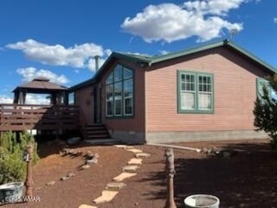 WELCOME TO YOUR DREAM HOME IN THE WHITE MOUNTAIN LAKES AREA! You on Silver Creek Golf Club in Arizona - for sale on GolfHomes.com, golf home, golf lot