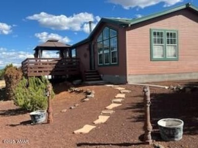 WELCOME TO YOUR DREAM HOME IN THE WHITE MOUNTAIN LAKES AREA! You on Silver Creek Golf Club in Arizona - for sale on GolfHomes.com, golf home, golf lot