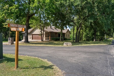 Situated on an oversized corner lot in the gated community of on The Coves Golf Course in Oklahoma - for sale on GolfHomes.com, golf home, golf lot