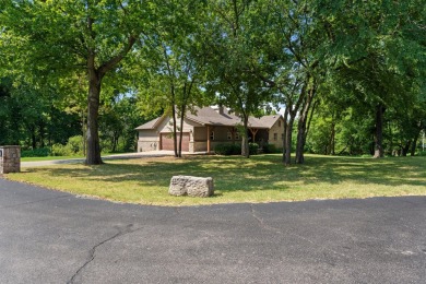 Situated on an oversized corner lot in the gated community of on The Coves Golf Course in Oklahoma - for sale on GolfHomes.com, golf home, golf lot