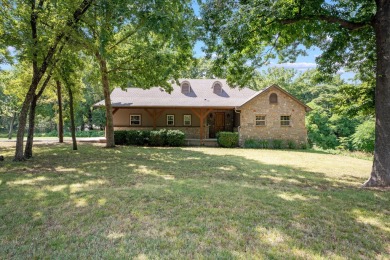 Situated on an oversized corner lot in the gated community of on The Coves Golf Course in Oklahoma - for sale on GolfHomes.com, golf home, golf lot